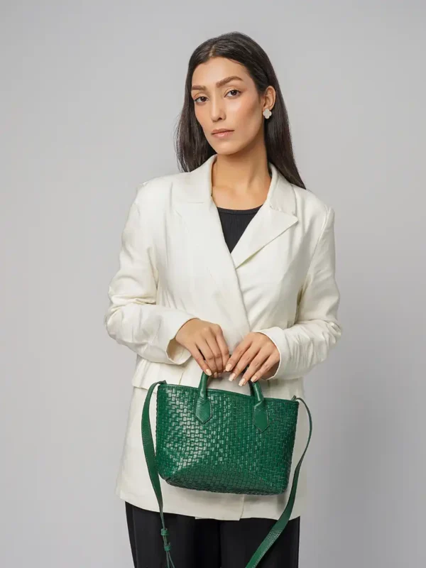 Fashion-Model-Holding-Serene-Woven-Green-Handbag-Front-View-Cahlah-Australia