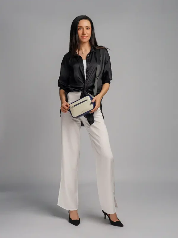 Girl-Wearing-Leather-Pathfinder-Sling-Bag-Navy-Side-View-Cahlah-Au-Sydney