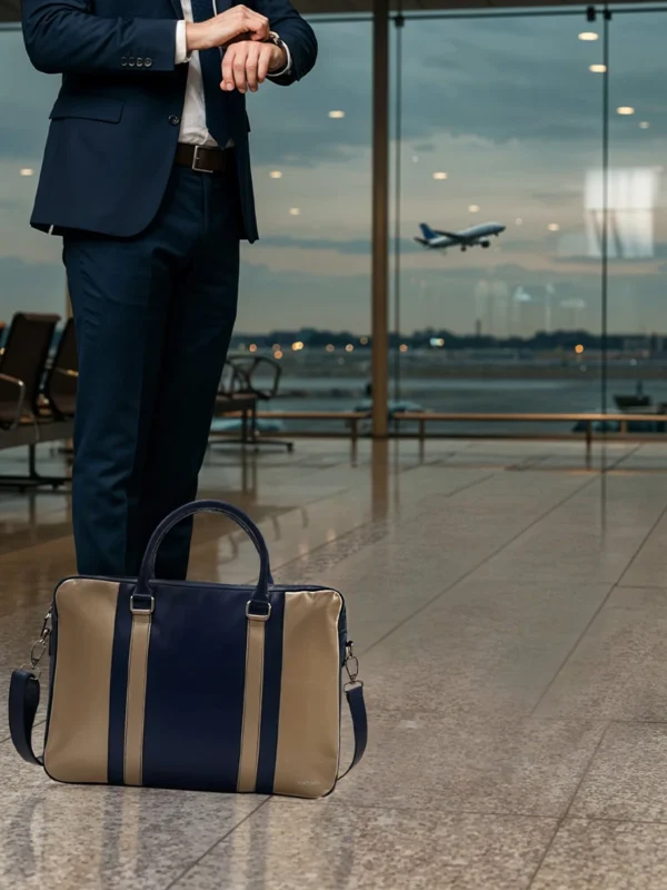 Man-Travelling-At-Airport-Invictus-Laptop-Bag-Navy-Cahlah