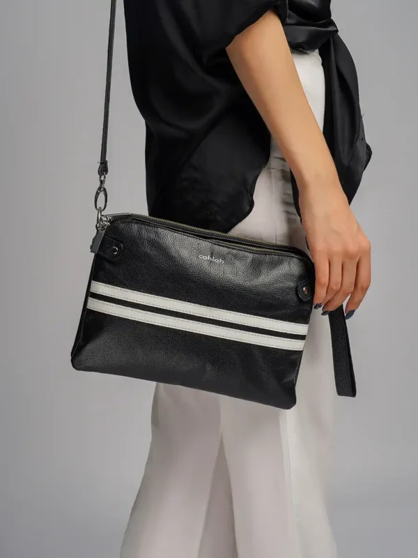 Trendy-Woman-Carrying-Urban-Line-Crossbody-Bag- Black -Closeup-View