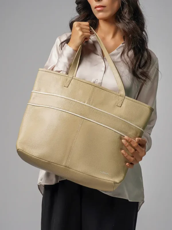 Trendy-Woman-Holding-Aria-Carry-Tote-Bag-Beige-Cahlah-Australia