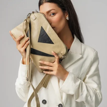 Trendy-Woman-Holding-Metro-Chic-Crossbody-Bag