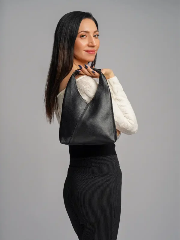 Woman-Carrying-Designer-Handbag-Mira-Black-Cahlah-au