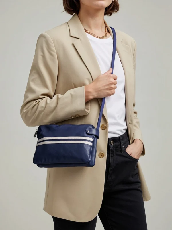 Casual-Dress-Woman-Carrying-Urban-Line-Crossbody-Bag-Navy-Side-Pose