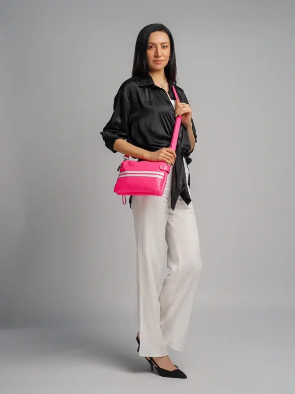 Girl-Carrying-Urban-Line-Crossbody-Bag- Pink-Side-View