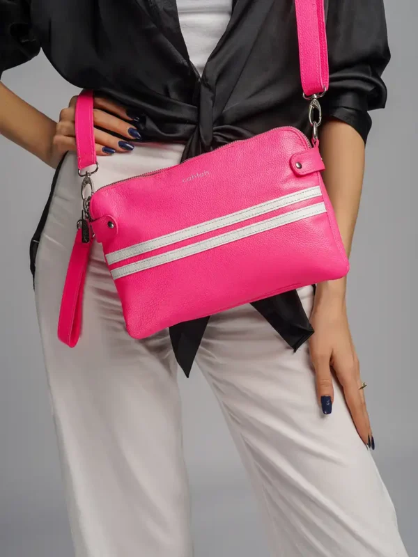 Trendy-Woman-Carrying-Urban-Line-Crossbody-Bag- Pink-Closeup-View