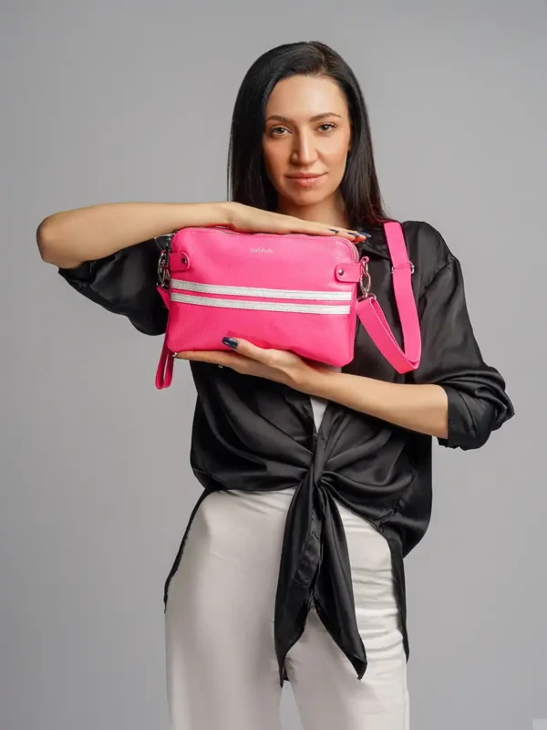 Woman-Carrying-Urban-Line-Crossbody-Bag- Pink