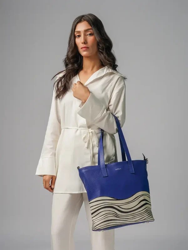 Women-Carrying-Bondi-Waves-Tote-Bag-Navy-Leather-Front-Image